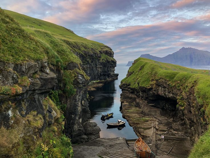 capturing the dramatic cliffs, waterfalls, and rolling green hills of the Faroe Islands