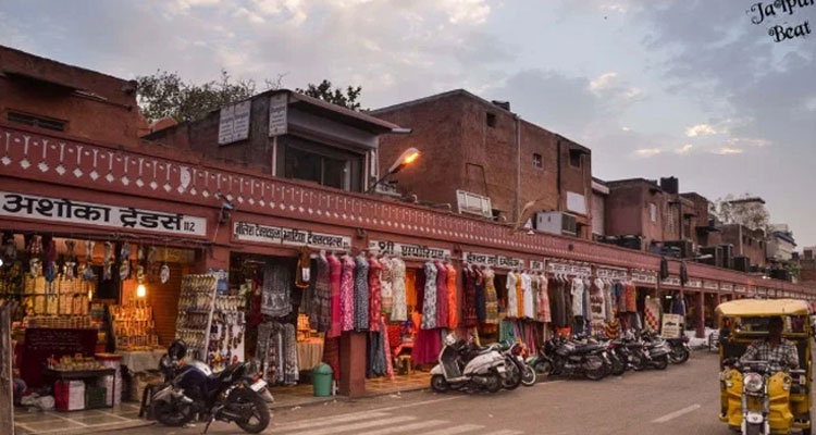 Johari Bazaar in Jaipur, with rows of traditional jewelry shops displaying gold, silver, and gemstones.

