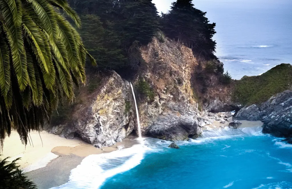 McWay Falls cascading onto a secluded beach in  California
