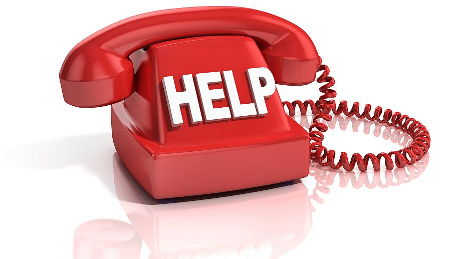 Solo traveler saving local emergency contact numbers on phone

